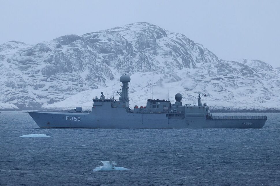 A Danish Navy frigate patrols near Nuuk, Greenland. A Danish Navy frigate patrols near Nuuk, Greenland.