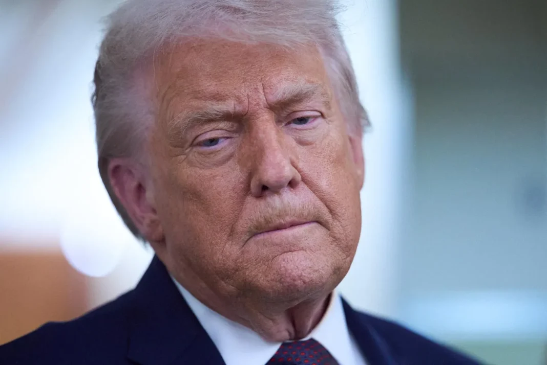 President Donald Trump speaks with reporters aboard Air Force One after leaving the World Economic Forum in Davos for Washington, Thursday, Jan. 22, 2026. (AP PhotoEvan Vucci)