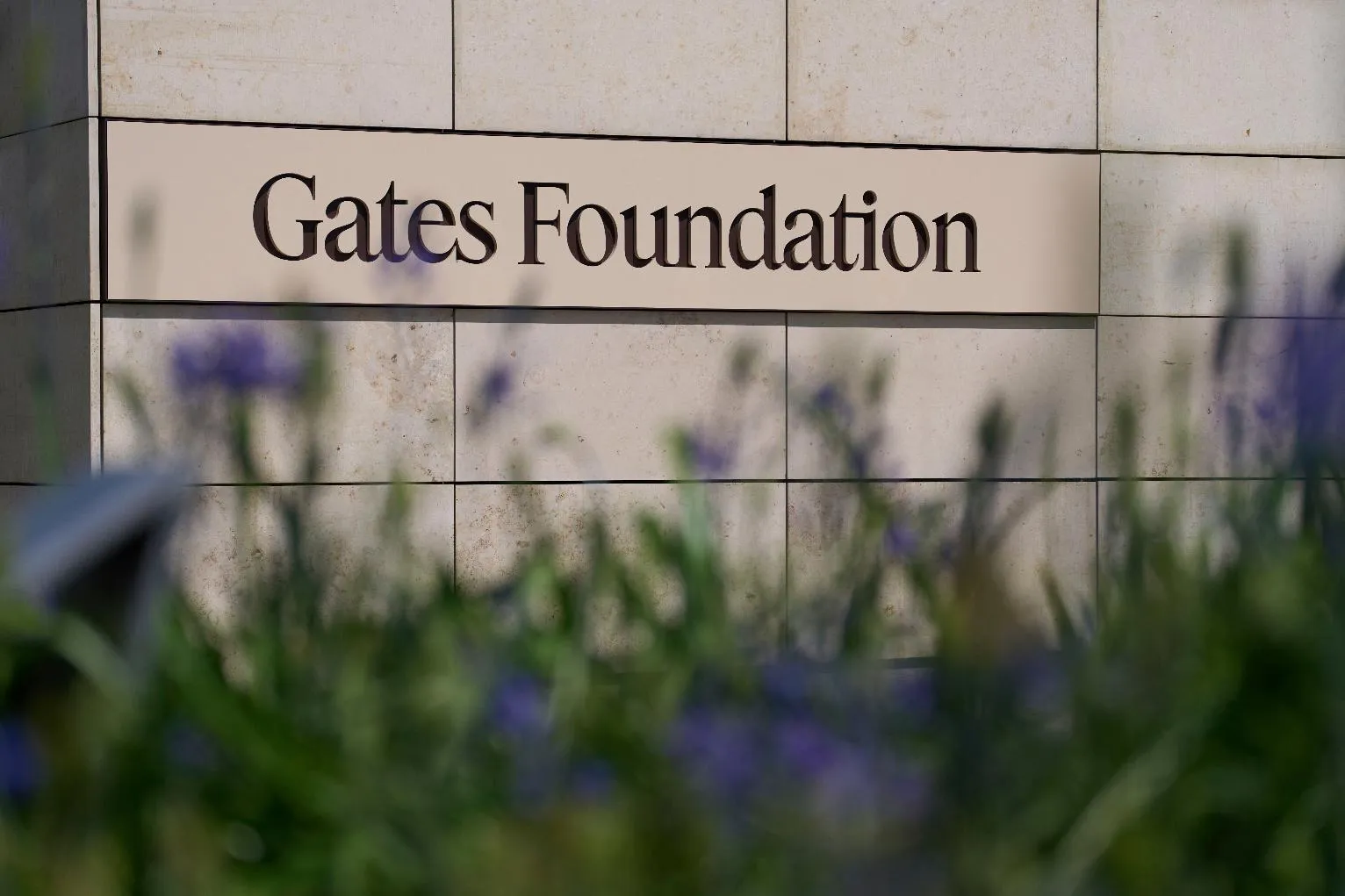 FILE - The Gates Foundation campus sign is seen April 30, 2025, in Seattle. (AP Photo/Lindsey Wasson, File)